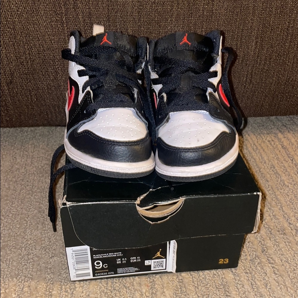 Air Jordan Black and White Sneakers with Red Accents